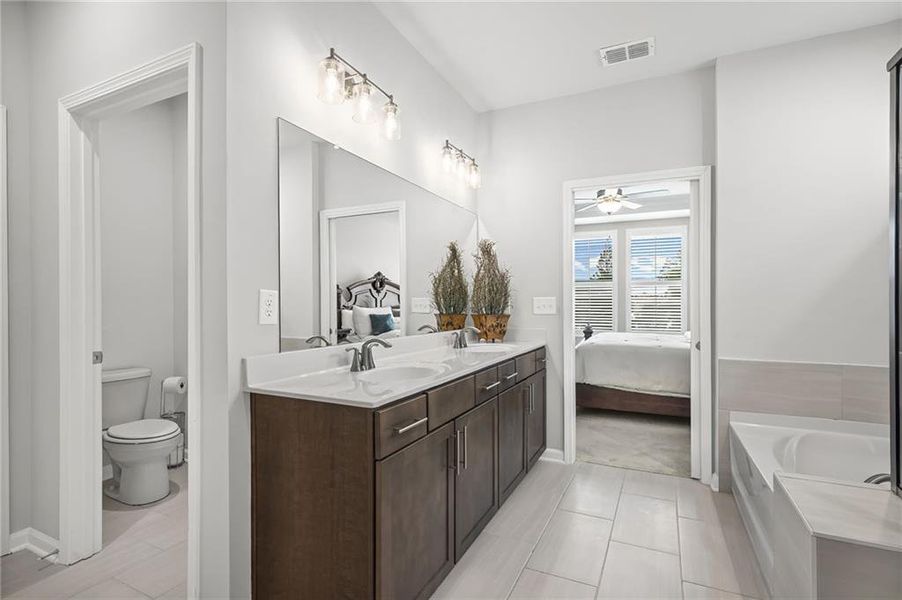 Furnished interior view inside a new home in Sun City Peachtree, Griffin (Image 12).
