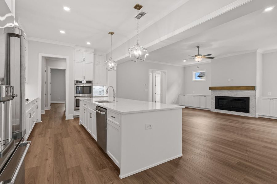 Representative furnished interior of a home built from the The Danville by The Providence Group in Bellwyn, Alpharetta (Image 10).