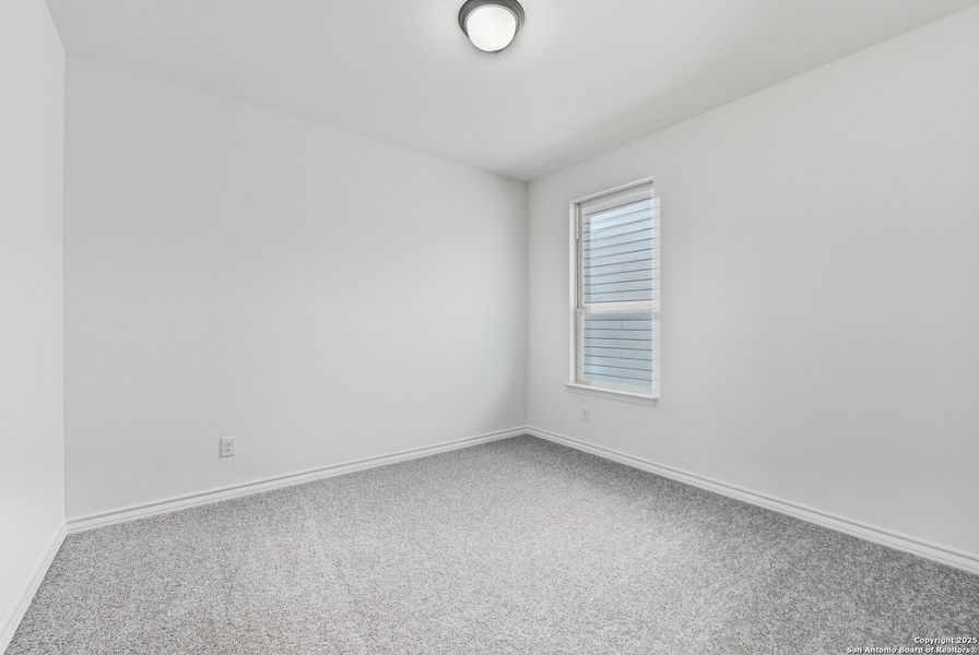 Spacious, unfurnished interior of a new home in Bison Ridge, San Antonio (Image 14).
