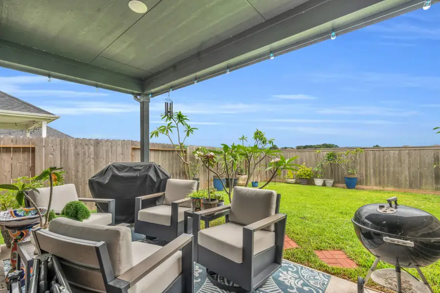 A wonderful/covered back patio and fully fenced in back yard. NO BACKYARD NEIGHBORS - EVER! A wonderful/covered back patio and fully fenced in back yard. NO BACKYARD NEIGHBORS - EVER!