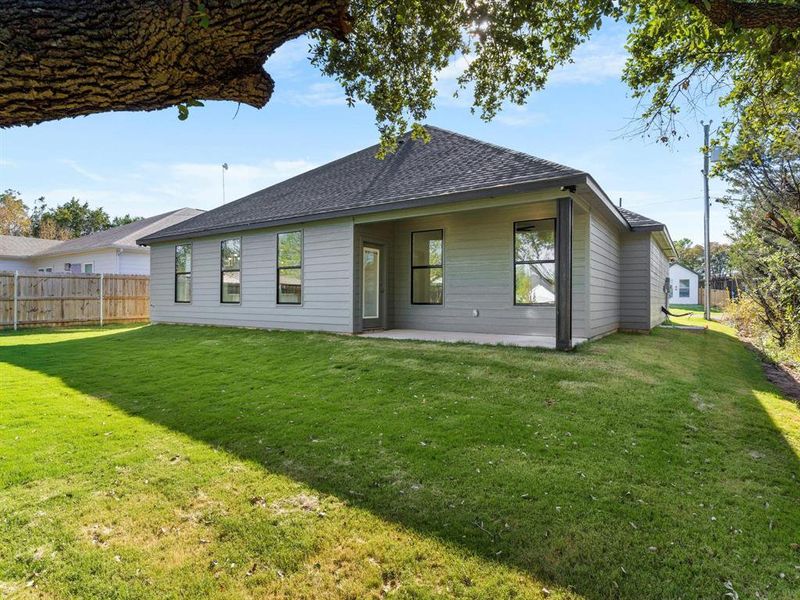 Exterior details and patio area of a home in , Granbury (Image 26).