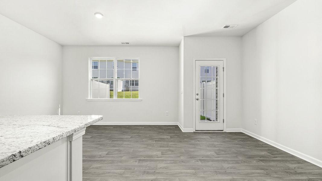 Spacious, unfurnished interior of a new home in North Village Townes, Greensboro (Image 8).