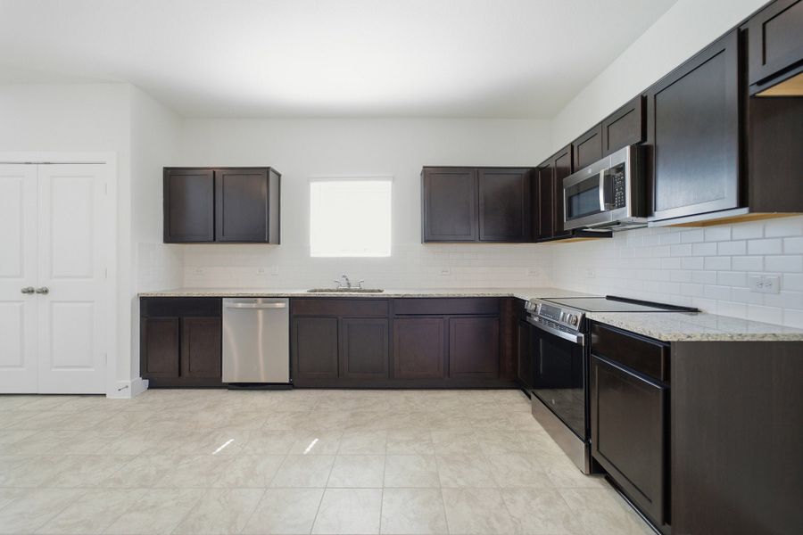 Furnished interior view inside a new home in Grande Estates, Bertram (Image 10).