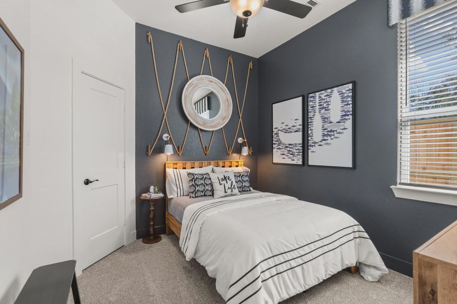 Representative furnished interior of a home built from the Athens by Chesmar Homes in The Woodlands Hills, Willis (Image 10).