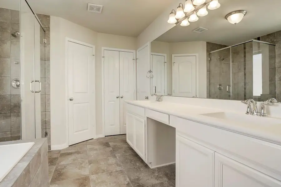 Relaxing owner's bath (*Photo not of actual home and used for illustration purposes only.)