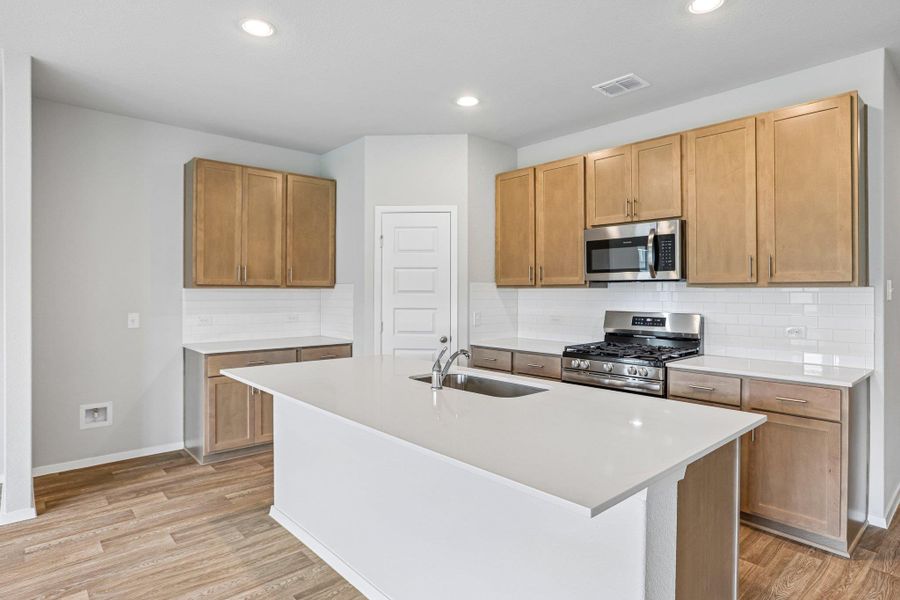 Furnished interior view inside a new home in Cloverleaf, Austin (Image 6). Furnished interior view inside a new home in Cloverleaf, Austin (Image 6).