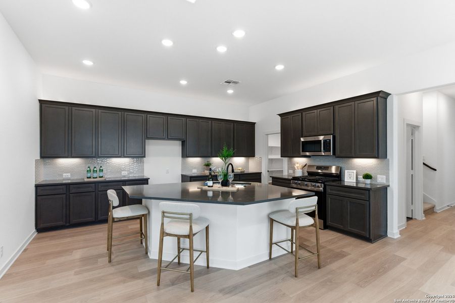 Furnished interior view inside a new home in The Crossvine, Schertz (Image 12).