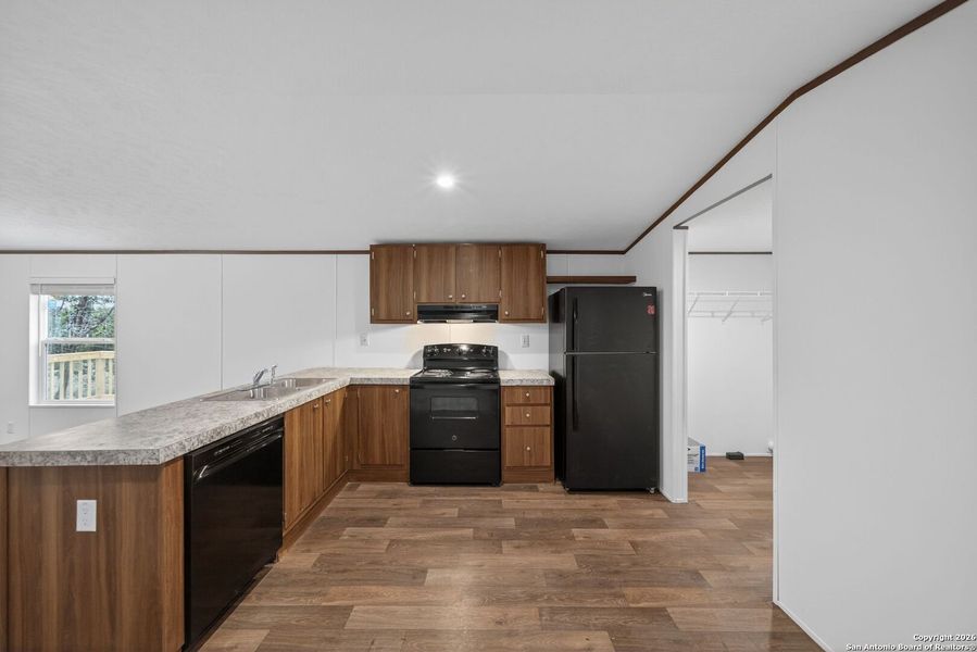 Furnished interior view inside a new home in , Bandera (Image 8).