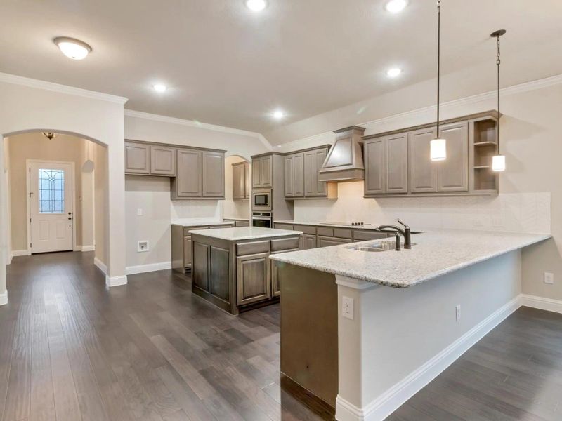 Kitchen | Concept 2533 at Mockingbird Hills in Joshua, TX by Landsea Homes