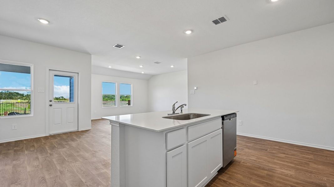 Furnished interior view inside a new home in Watermill, Uhland (Image 7).