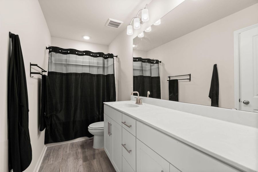 Furnished interior view inside a new home in Jasmine Point at Lakes of Cane Bay, Summerville (Image 17).