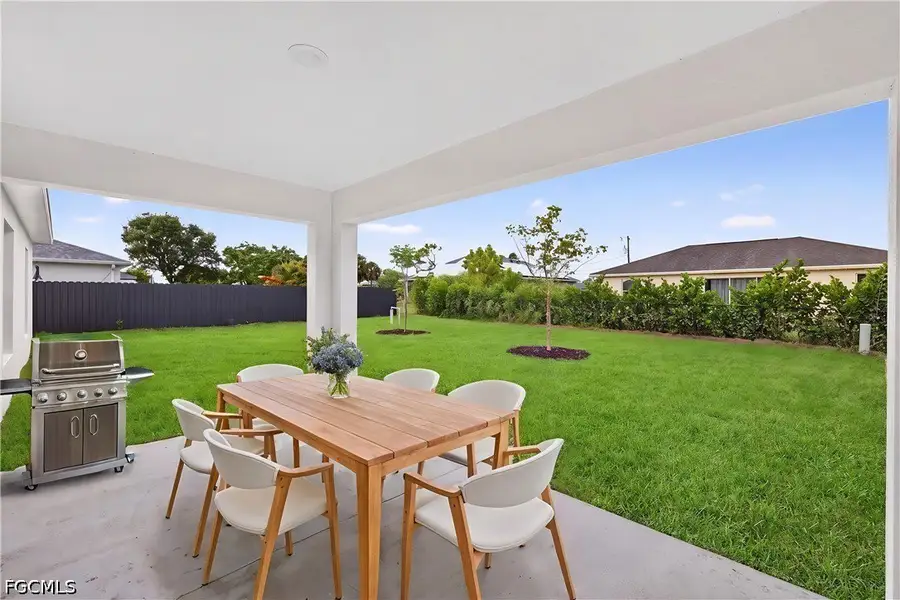 Exterior details and patio area of a home in Cape Coral, Cape Coral (Image 3).