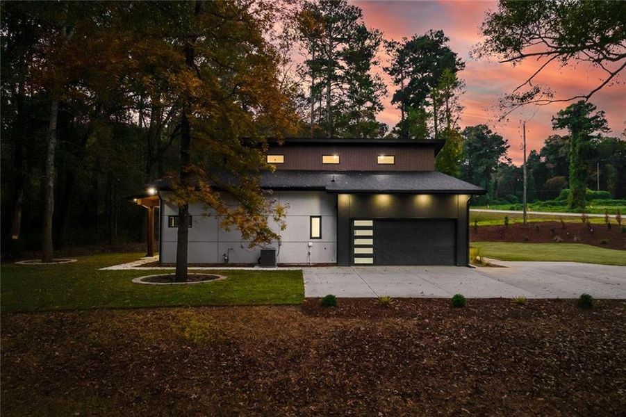 Front exterior of a new home in , Winder, GA, highlighting curb appeal (Image 27). Front exterior of a new home in , Winder, GA, highlighting curb appeal (Image 27).