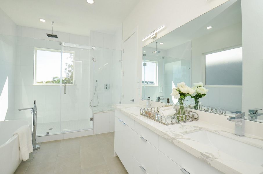Primary Bathroom(Sample photo from similar floor plan built by the builder)