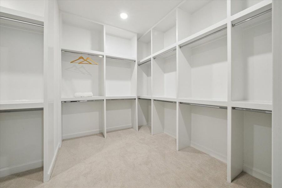 Another view of the generouslysized primary closet.