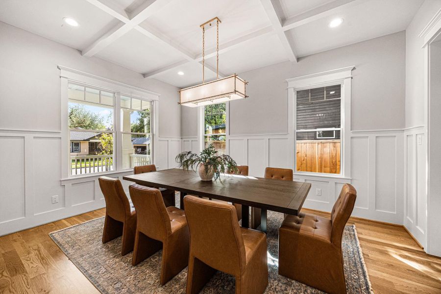 Coffered ceilings and wainscotting elevate the space. Coffered ceilings and wainscotting elevate the space.