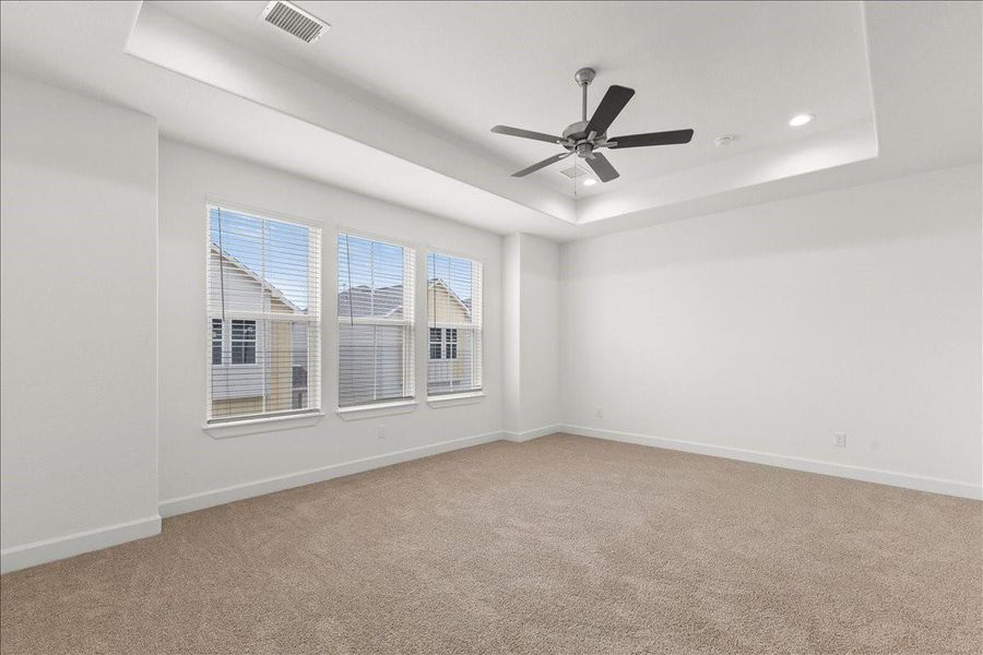 Primary bedroom, large enough for a sitting area