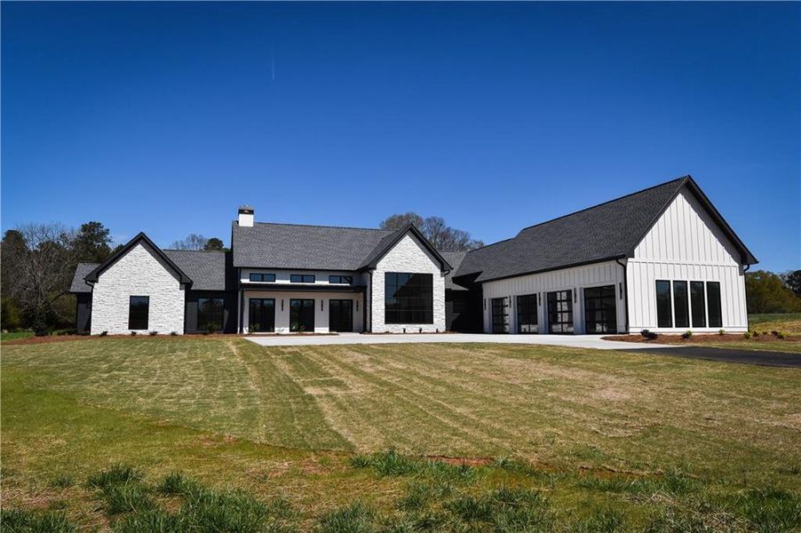 Front exterior of a new home in , Bishop, GA, highlighting curb appeal (Image 2). Front exterior of a new home in , Bishop, GA, highlighting curb appeal (Image 2).