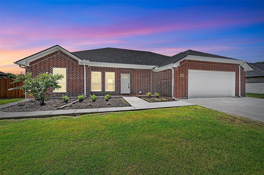 Front exterior of a new home in , Ector, TX, highlighting curb appeal (Image 22). Front exterior of a new home in , Ector, TX, highlighting curb appeal (Image 22).