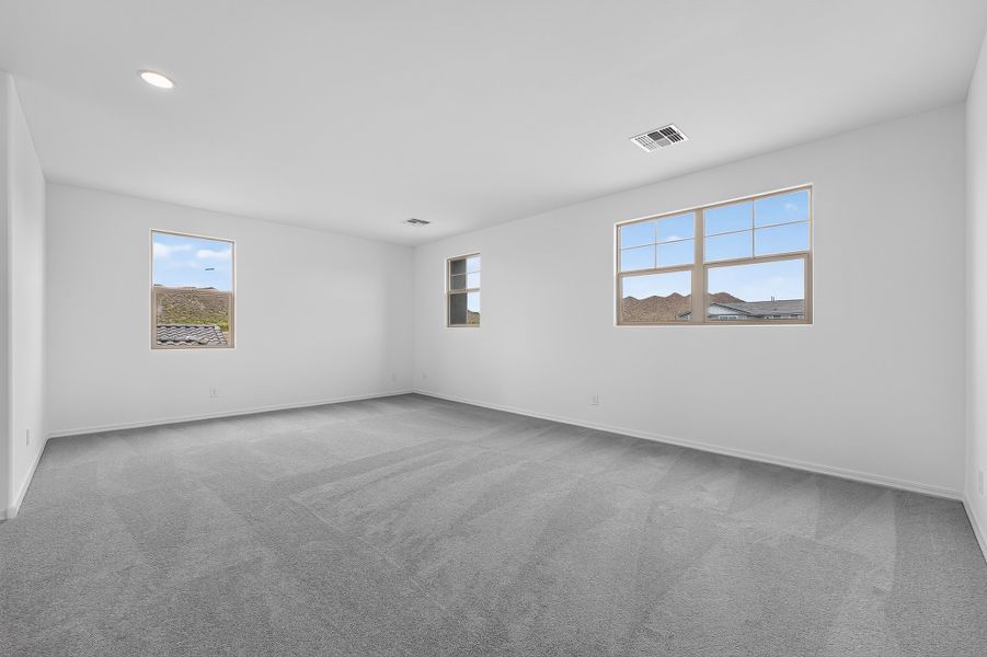 Spacious, unfurnished interior of a new home in Ladera Trails, Queen Creek (Image 23).