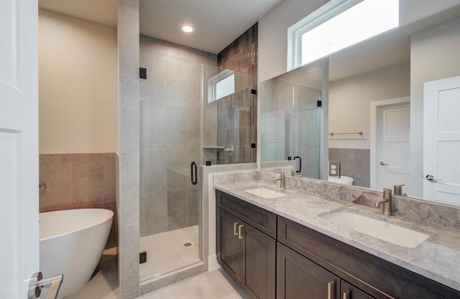 Gorgeous primary bath. (Transitional finish shown).