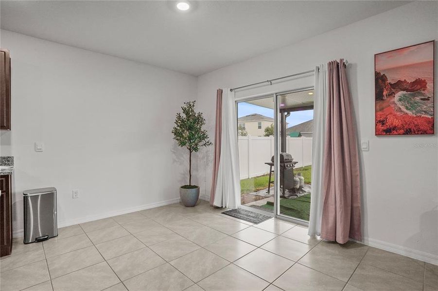 Lots of room for informal eating or turn this into your dining room with sliders out to backyard Lots of room for informal eating or turn this into your dining room with sliders out to backyard