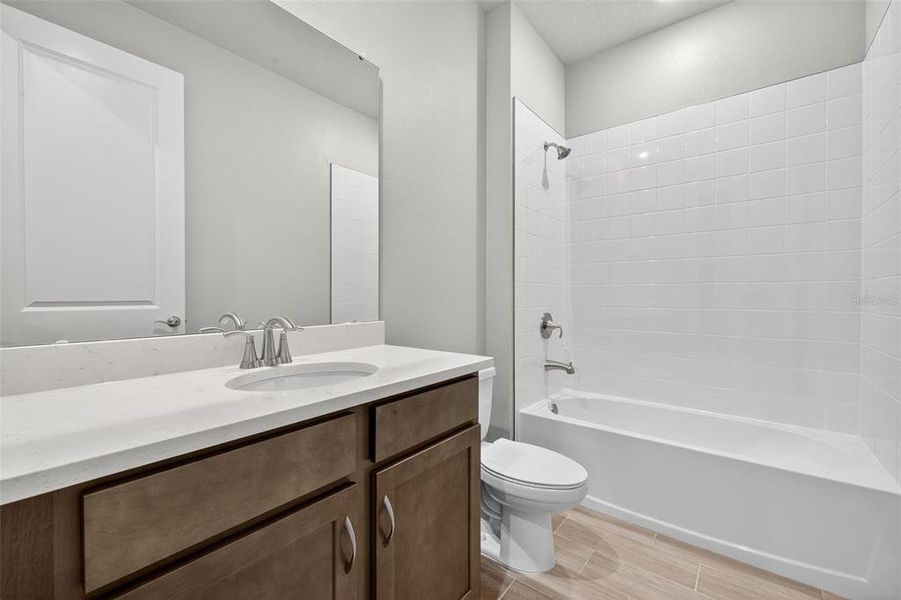 Furnished interior view inside a new home in Windwater, Parrish (Image 7).