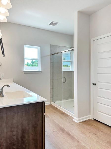The Oakshire II- Primary Bathroom with Large Walk-in Shower.