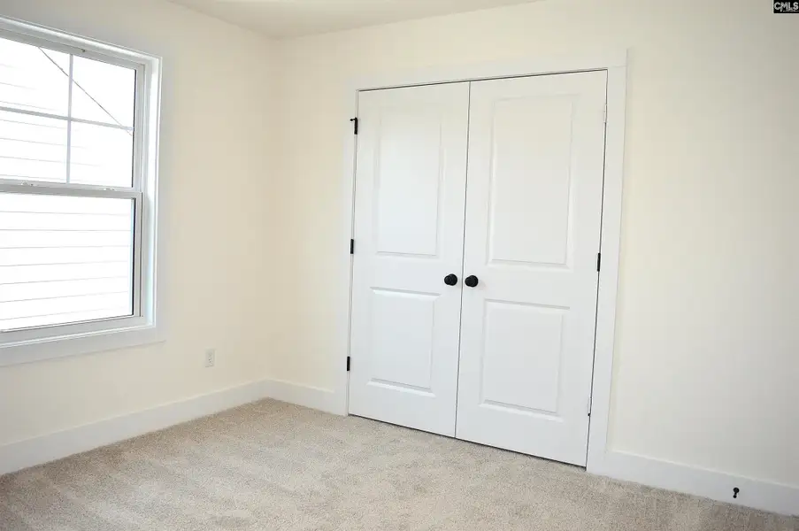 Spacious, unfurnished interior of a new home in Bickley Station, Irmo (Image 25).