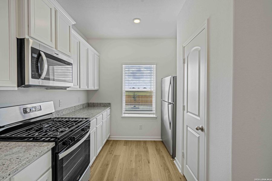 Furnished interior view inside a new home in , San Antonio (Image 3).