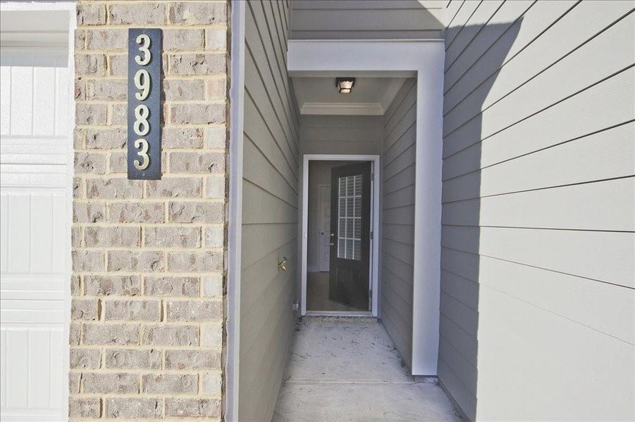 Exterior details and patio area of a home in Somerset at Riverbrook, Gainesville (Image 3).