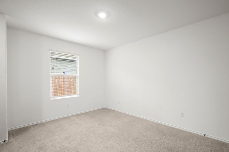 The dining area provides ample room for a kitchen table of any size or shape.