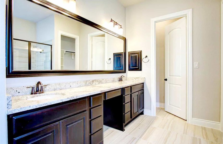 Representative furnished interior of a home built from the 4198 by Ravenna Homes in The Woodlands Hills 65′, Willis (Image 10).