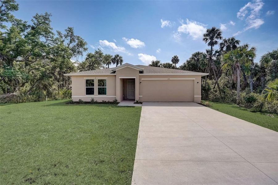 Front exterior of a new home in Citrus Springs, Citrus Springs, FL, highlighting curb appeal (Image 12).