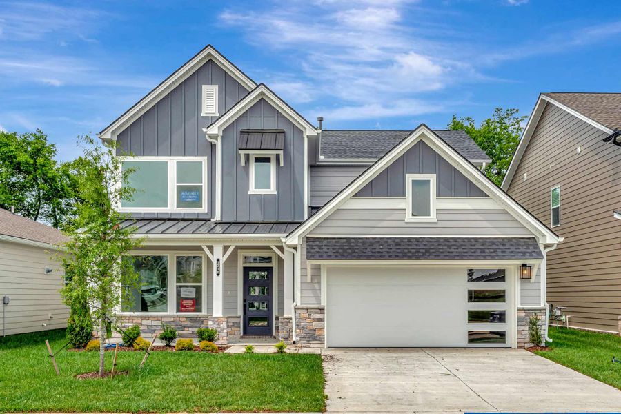 Representative exterior photo of a completed home built from the The Boxwell by David Weekley Homes in The Preserve at Five Oaks, Lebanon, TN (Image 2). Representative exterior photo of a completed home built from the The Boxwell by David Weekley Homes in The Preserve at Five Oaks, Lebanon, TN (Image 2).