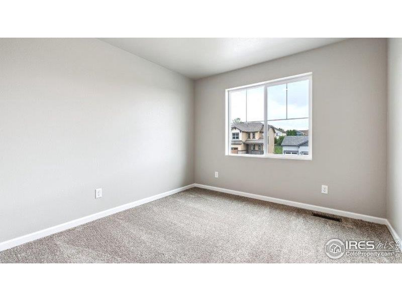 Spacious, unfurnished interior of a new home in Highlands Preserve, Mead (Image 9).