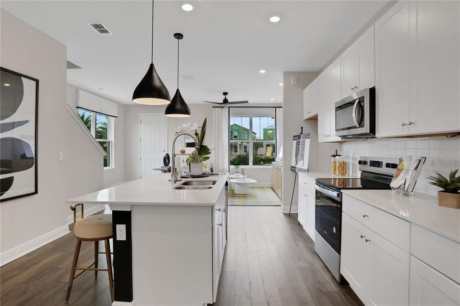 Furnished interior view inside a new home in Serenade at Ovation, Winter Garden (Image 17).