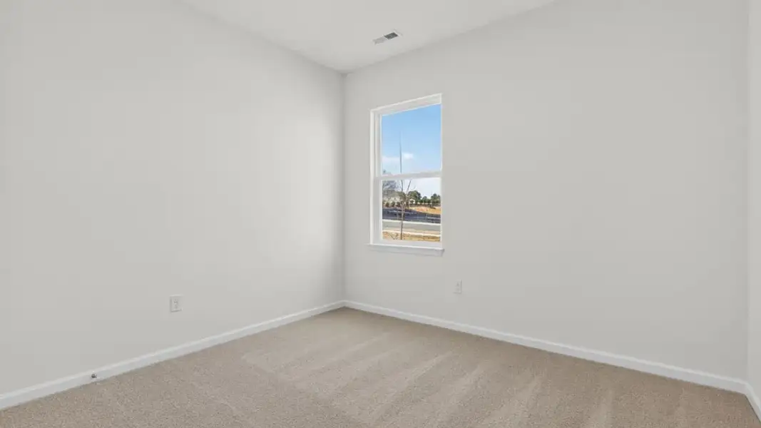 Spacious, unfurnished interior of a new home in Honeycutt Oaks, Angier (Image 27).
