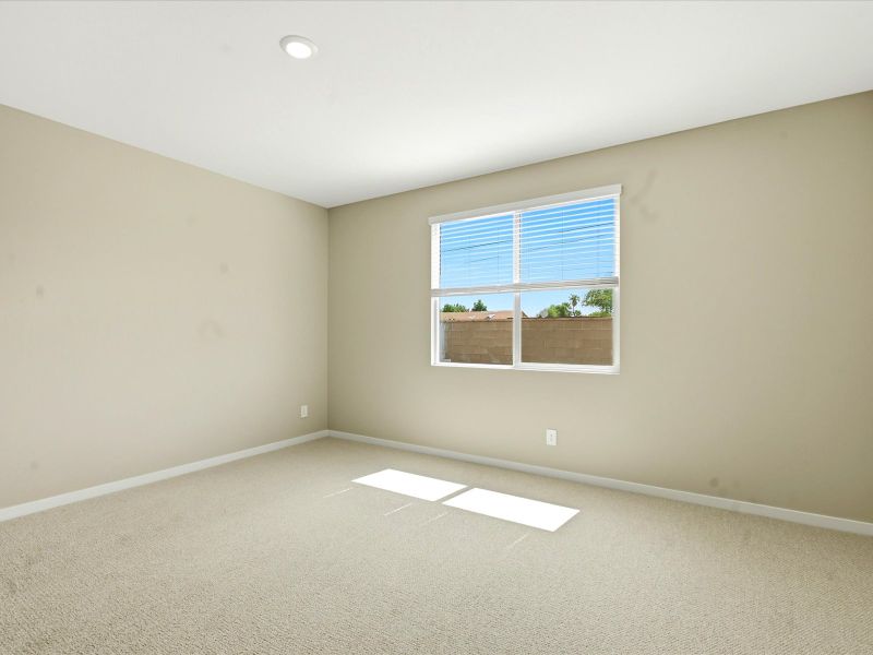 Spacious, unfurnished interior of a new home in Blossom Rock Signature Series, Apache Junction (Image 10).