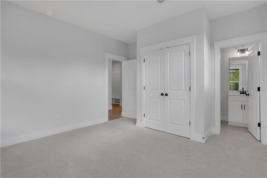 Spacious, unfurnished interior of a new home in The Paddocks at Doc Hughes, Buford (Image 47).
