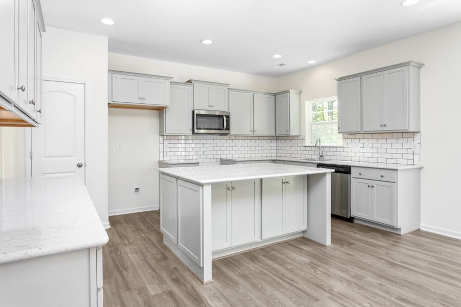 Furnished interior in a model home at Council Creek in Graham (Image 7).