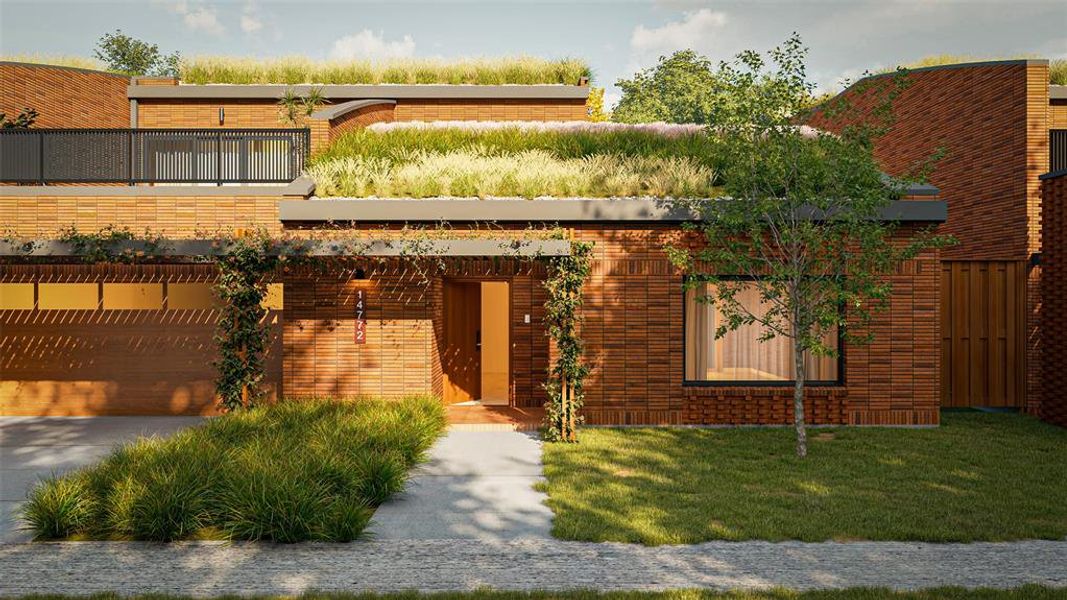 Contemporary house featuring brick siding, a front lawn, and a garage