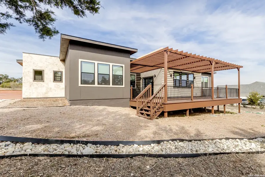 Exterior details and patio area of a home in , Spring Branch (Image 3).