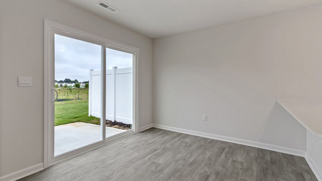Spacious, unfurnished interior of a new home in The Townes at Honeycutt Oaks, Angier (Image 12).