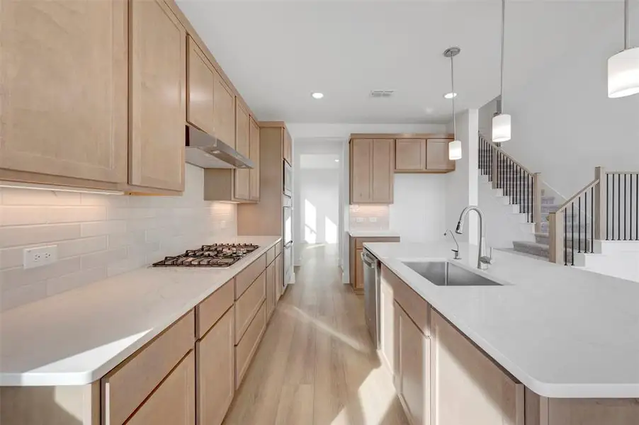 Furnished interior view inside a new home in Lily Creek at Sutton Fields, Aubrey (Image 9).