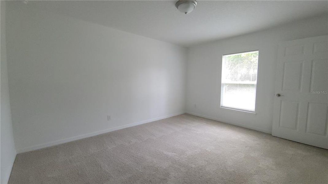 Spacious, unfurnished interior of a new home in , Daytona Beach (Image 8).