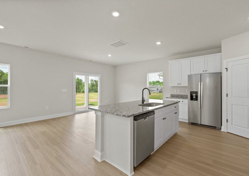 The kitchen overlooks the dining area