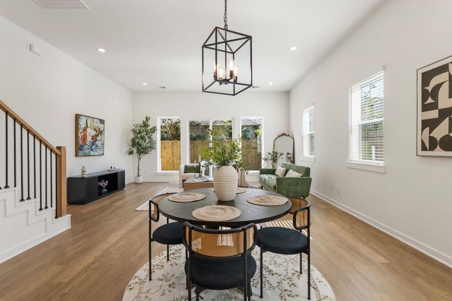 Spacious Dining area perfectly positoned between kitchen and living room.