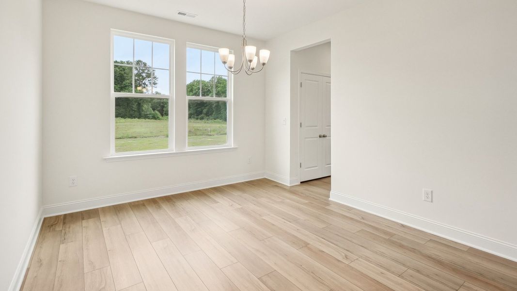 Furnished interior view inside a new home in Whispering Pines, Franklinton (Image 11).