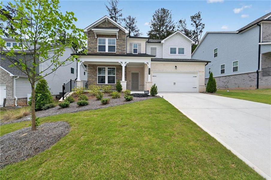 Front exterior of a new home in Bailey Fence, Dacula, GA, highlighting curb appeal (Image 29). Front exterior of a new home in Bailey Fence, Dacula, GA, highlighting curb appeal (Image 29).